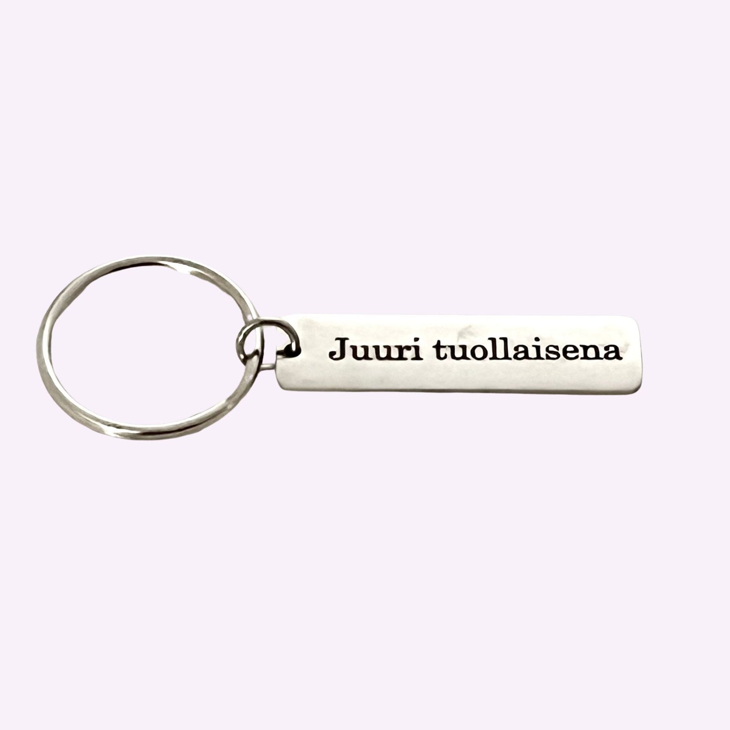 Hopeinen avaimenperä tekstillä Juuri tuollaisena.