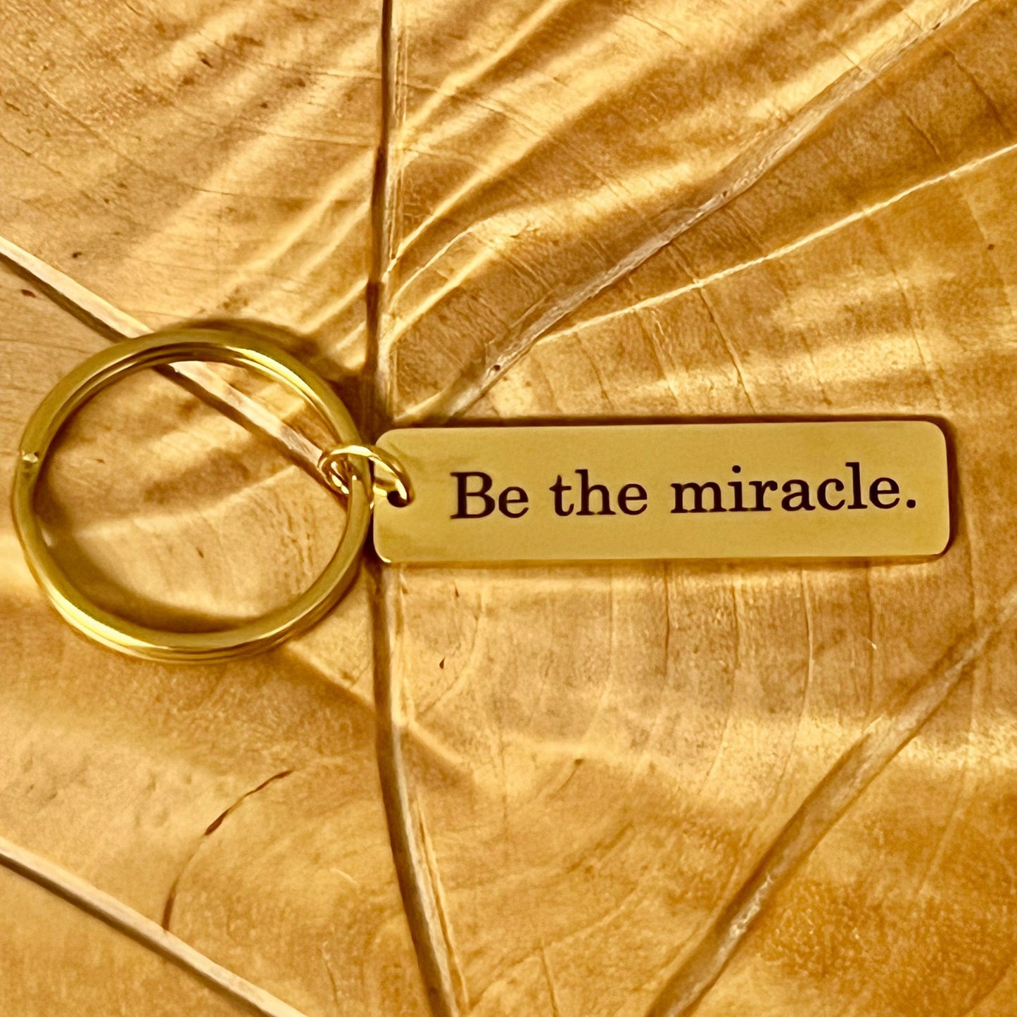 Nimikoitu avaimenperä, ruostumatonta terästä