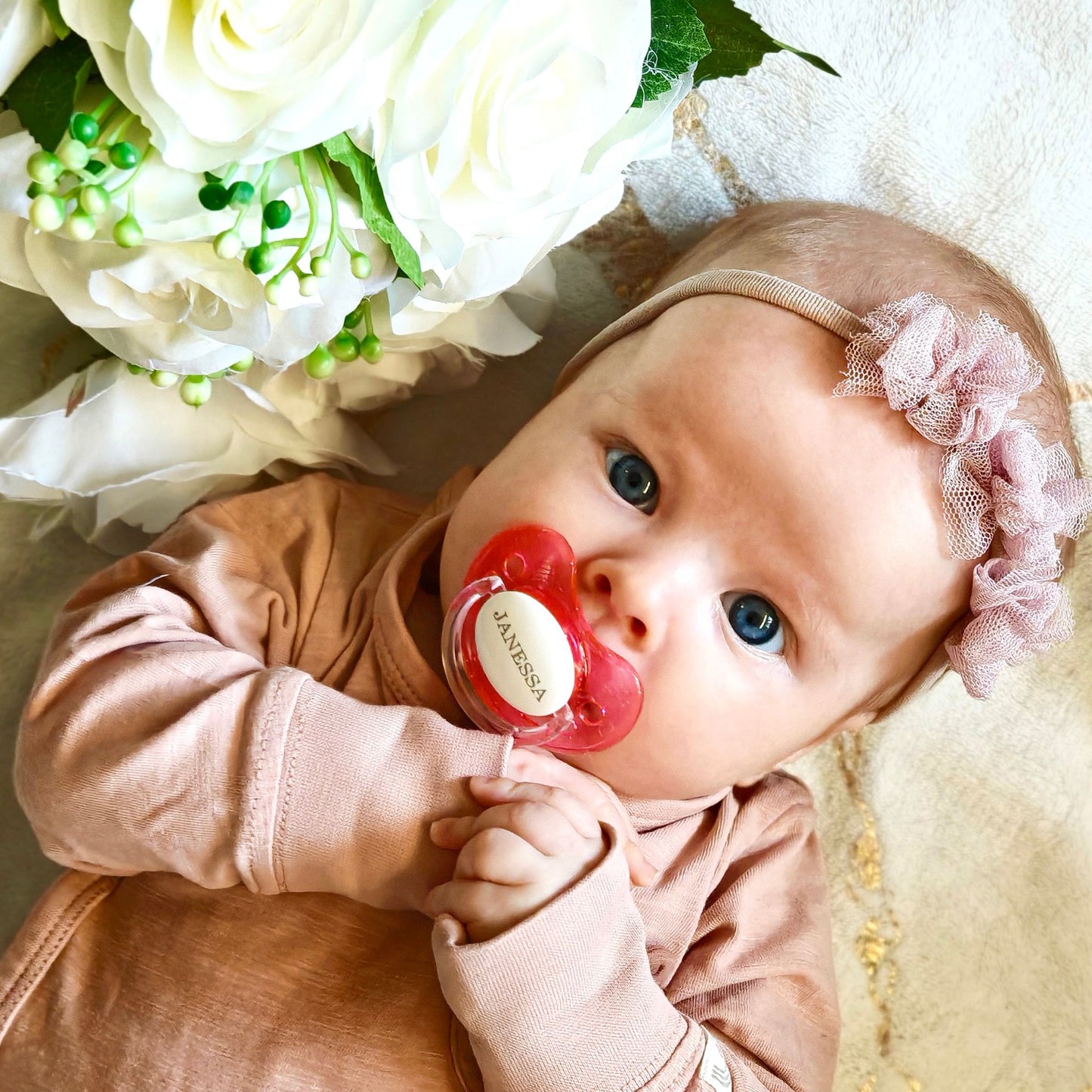 Kimaltava nimitutti vauvalle